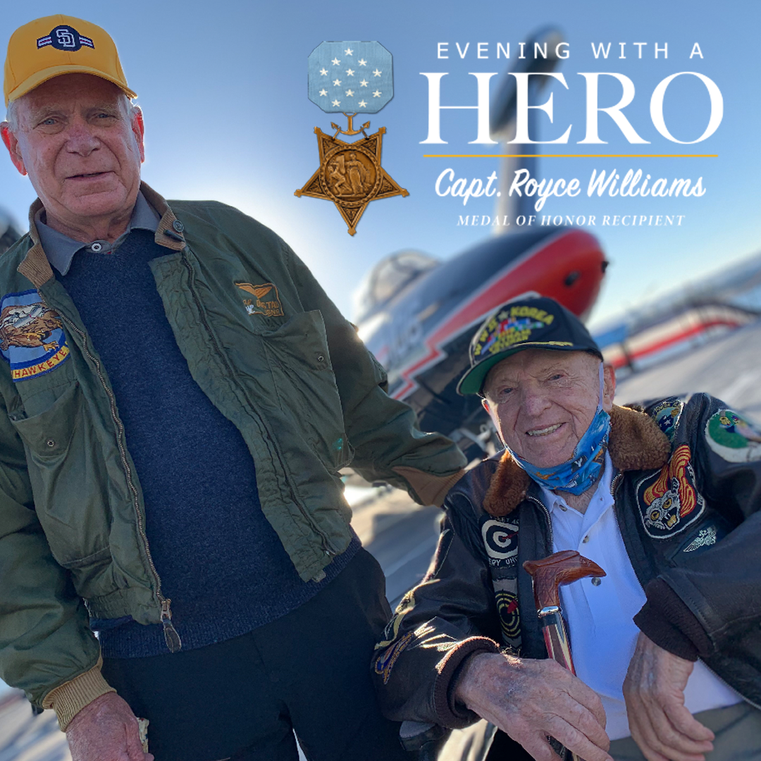 Evening with a Hero event with Captain Williams next to an aircraft